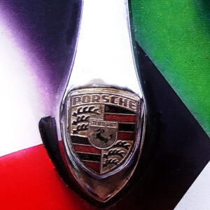 porsche logo with green red black and white