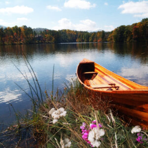 Wooden Boat on a Lake Wall Art by Artist Michael John Valentine of Huntersville